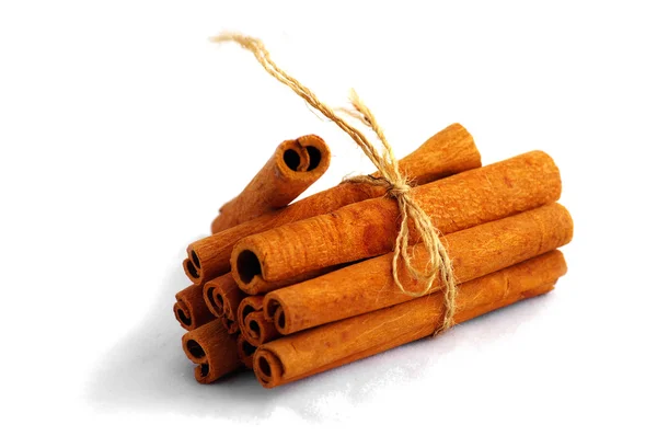 Closeup picture of aromatic cinnamon on sacking. — Stock Photo, Image