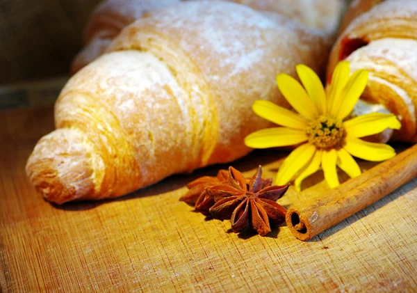 Stock image Some croissants on the wood texture