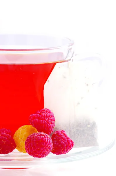 Raspberry tea in glass cup — Stock Photo, Image