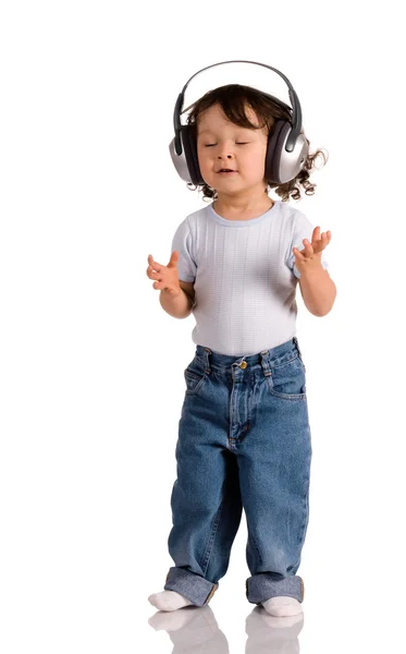 Baby med hörlurar — Stockfoto