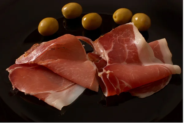 Ham and olives — Stock Photo, Image
