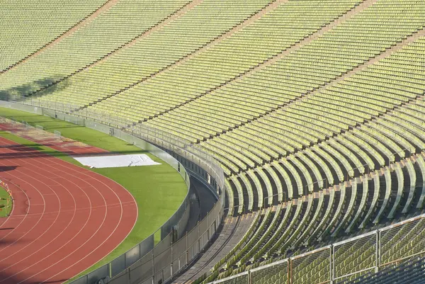 Stadionbestuhlung mit Leichtathletikbahn — Stockfoto