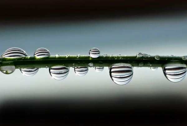 Water drops with strips — Stock Photo, Image