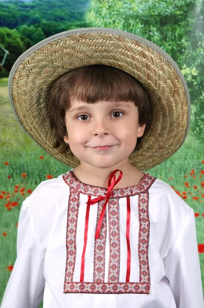 Hasır Şapkalı yakışıklı çocuk — Stok fotoğraf