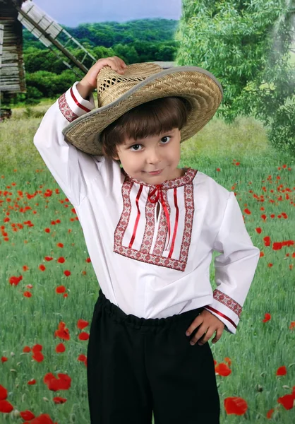 Όμορφο αγόρι σε ένα ψάθινο καπέλο — Φωτογραφία Αρχείου