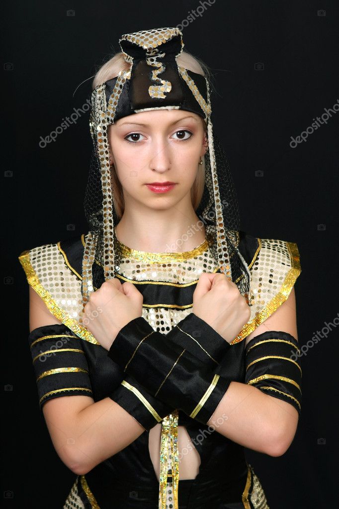 Beautiful Girl In The Egyptian Costume On A Black Background Stock