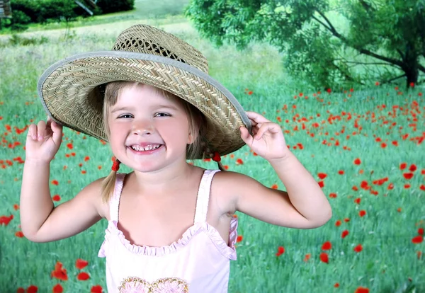 Riendo chica en un sombrero de paja —  Fotos de Stock
