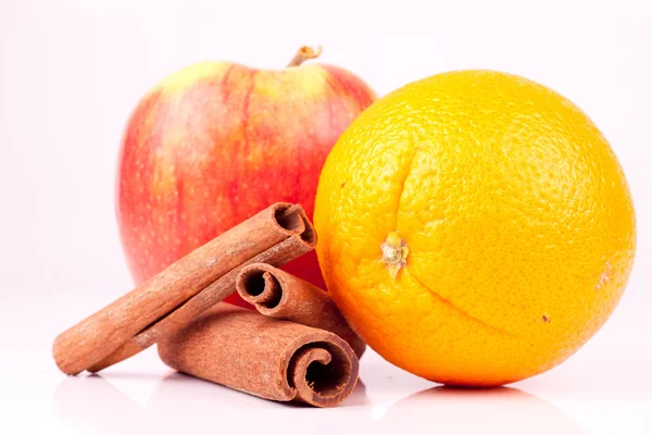 Apple,orange and cinnamon — Stock Photo, Image