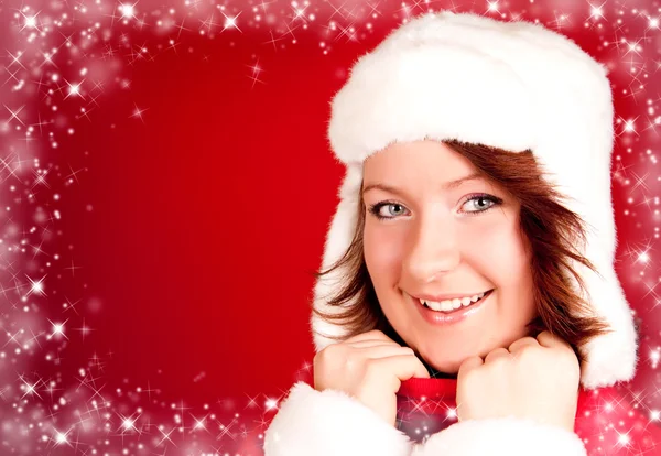 Roztomilá usmívající se dívka v šatech vánočními — Stock fotografie