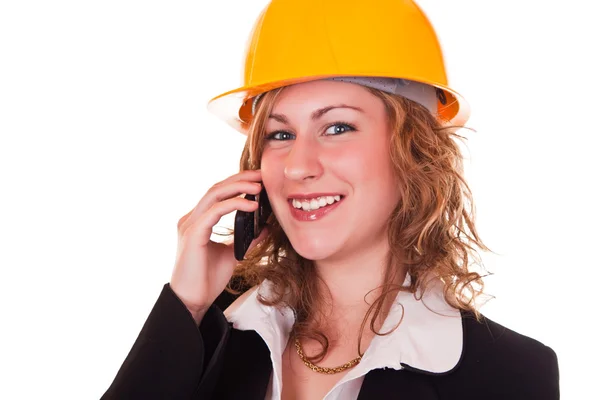 Businesswoman with helmet and phone — Stock Photo, Image
