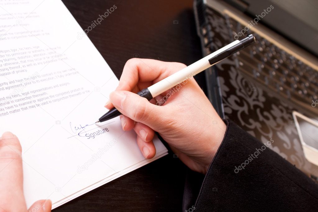 Signing a business document