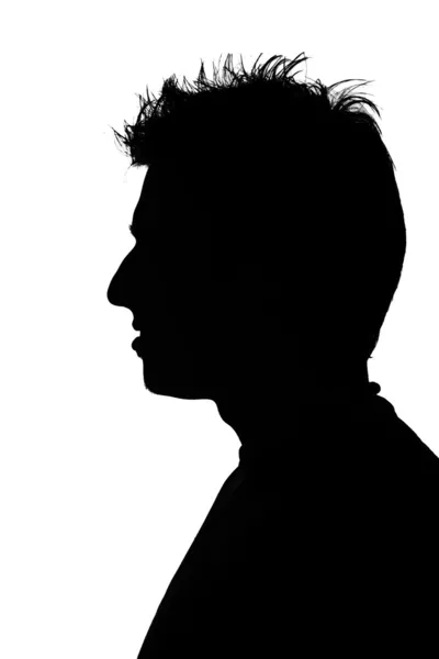 Silhouette of a young man — Stock Photo, Image