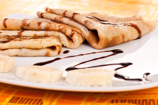 Pancakes and banaba rings — Stock Photo, Image