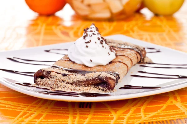 Delicious pancake with chocolate syrup — Stock Photo, Image