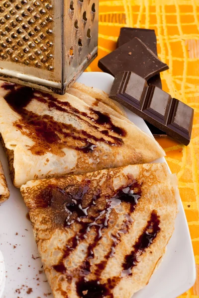 Pancakes and chocolate — Stock Photo, Image