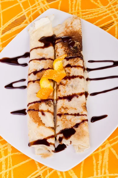 Pancakes and orange peel — Stock Photo, Image