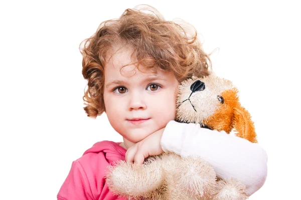 Klein meisje en haar speelgoed — Stockfoto