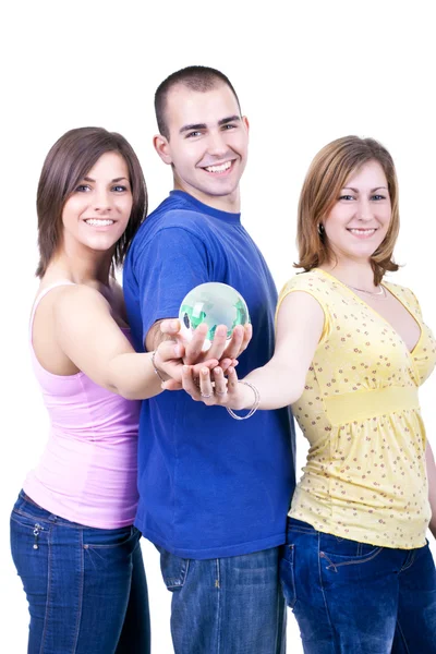 Três estudantes segurando globo — Fotografia de Stock