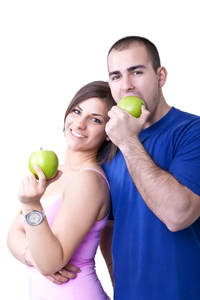 Couple eating healthy apples — Stock Photo, Image