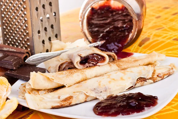 Pancakes filled with jam — Stock Photo, Image