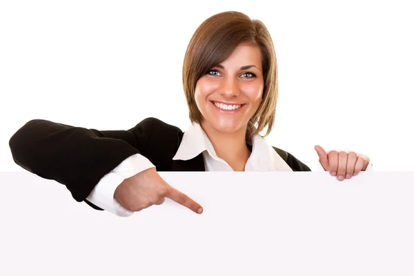 Business woman holding big blank paper — Stock Photo, Image