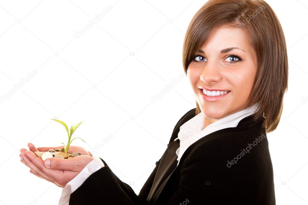 Growing plant with coins in hand
