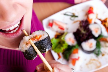 Eating sushi clipart