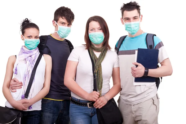 Teenagers with masks for protection — Stock Photo, Image