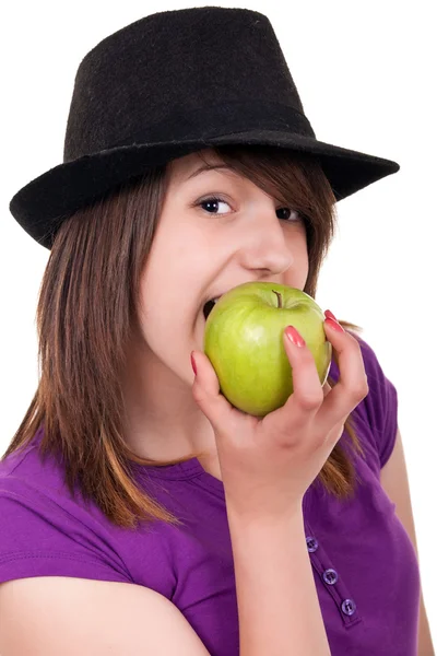Elma yiyen bir kızın portresi. — Stok fotoğraf