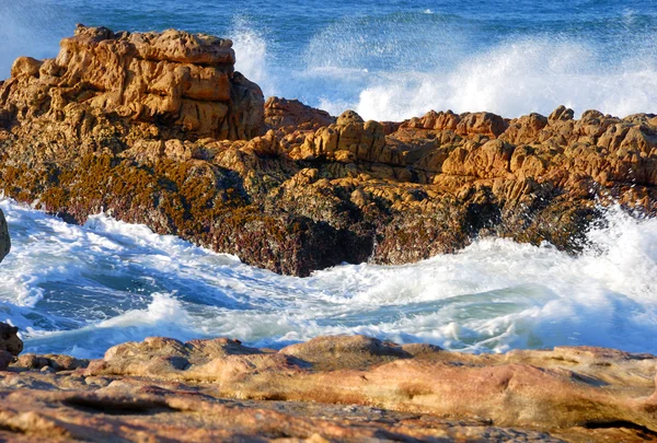 Ocean swirling through the rocks — Stock Photo, Image