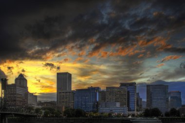 Dramatic Sunset Sky Over Portland Skyline clipart