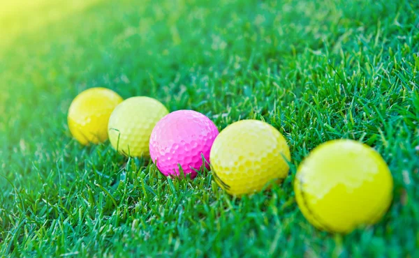 Four golf balls — Stock Photo, Image