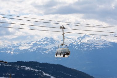 Chair lift at Whistler Peak British Columbia; clipart