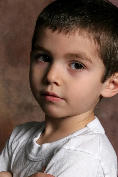 Boy with arms folded - Closeup — Stock Photo, Image