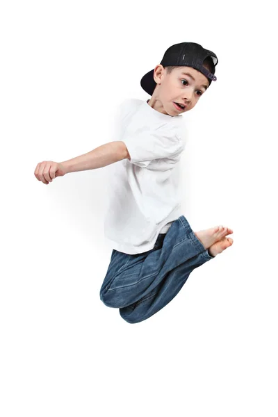 Μικρό αγόρι άλμα σε απομονωμένες λευκό φόντο — Φωτογραφία Αρχείου