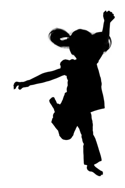 Silhouette of girl jumping up in the air — Stock Photo, Image