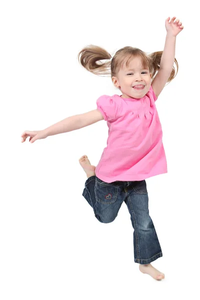 Bambina che salta su sfondo bianco isolato — Foto Stock