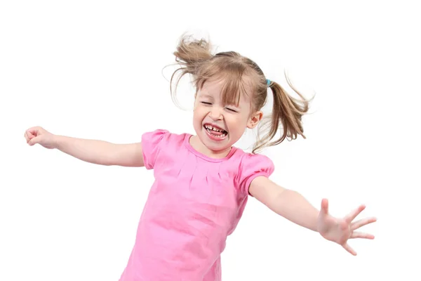 Klein meisje springen op geïsoleerde witte achtergrond — Stockfoto