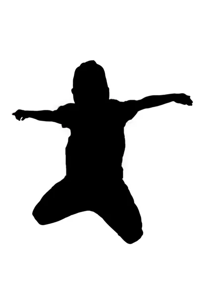 空気中でジャンプ少年のシルエット — ストック写真