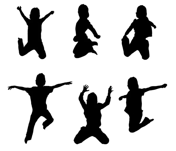 Silhouettes of boy jumping up in the air — Stock Photo, Image
