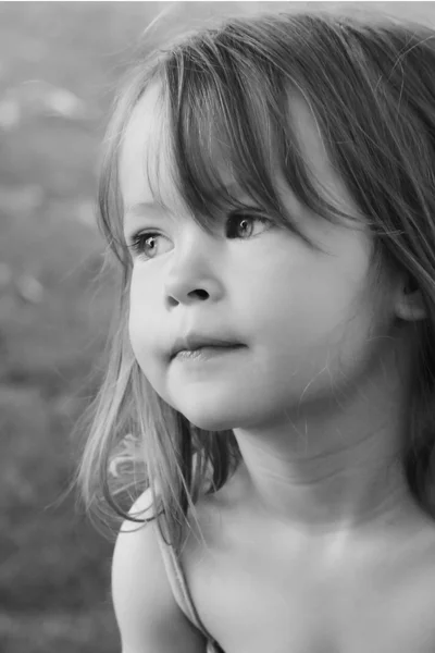 Adorable little girl taken closeup outdoors in s — Stock Photo, Image