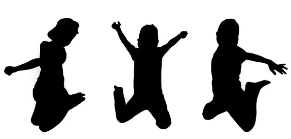 男孩在空中跳跃的 silhouettes — 图库照片