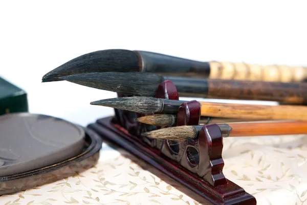 Chinese writing brushes and inkstone — Stock Photo, Image