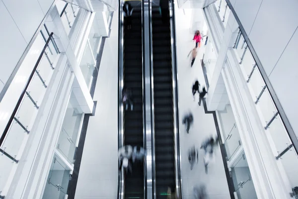 Motion blurred on stairs and escalator — Stock Photo, Image