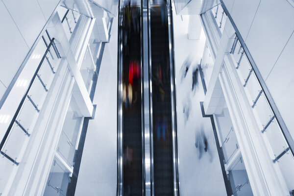 Motion blurred on escalator