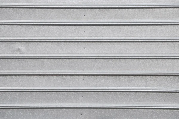 Superficie metálica gris con línea regular — Foto de Stock
