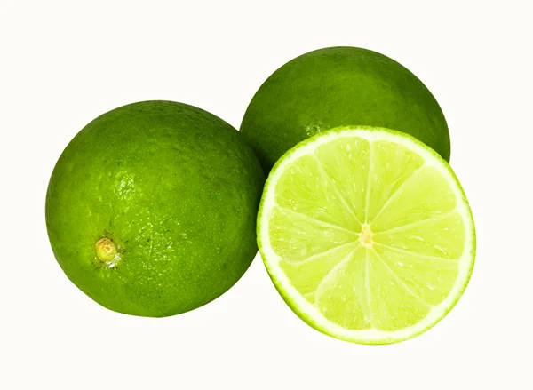 Två limefrukterna och hälften — Stockfoto