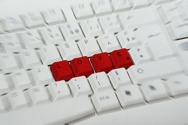 Röd love med tangentbordet — Stockfoto