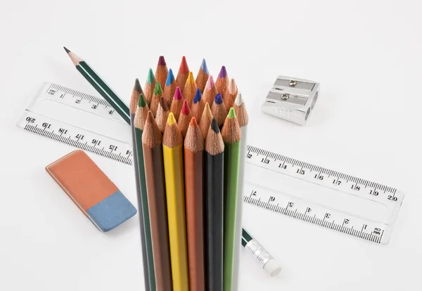 Group of colored pencils with school supplies — Stock Photo, Image