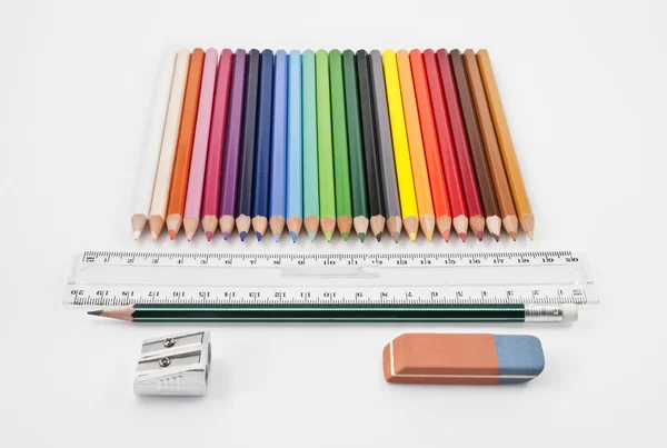 Straight alignment of basic school supplies — Stock Photo, Image